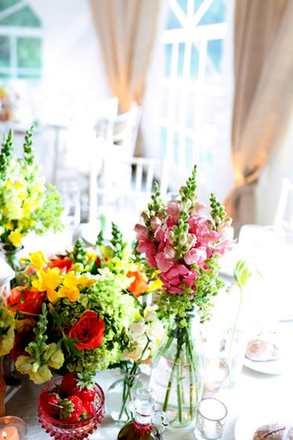 light pink, yellow and red floral centerpieces - charming Hudson Valley NY wedding photo by top New York wedding photographers Belathee Photography