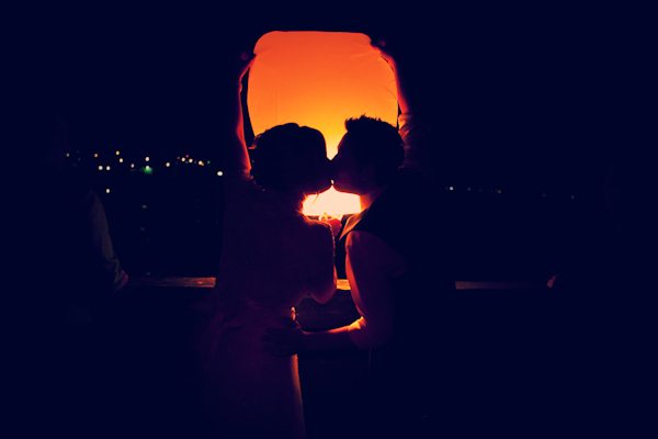 silhoutted happy couple kissing - photo by Southern California wedding photographers Callaway Gable
