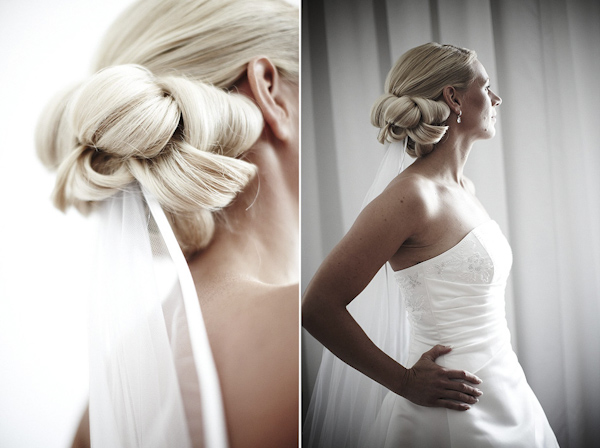 hairstyle of bride - bride looking out window - wedding photo by top Swedish wedding photographers Dayfotografi
