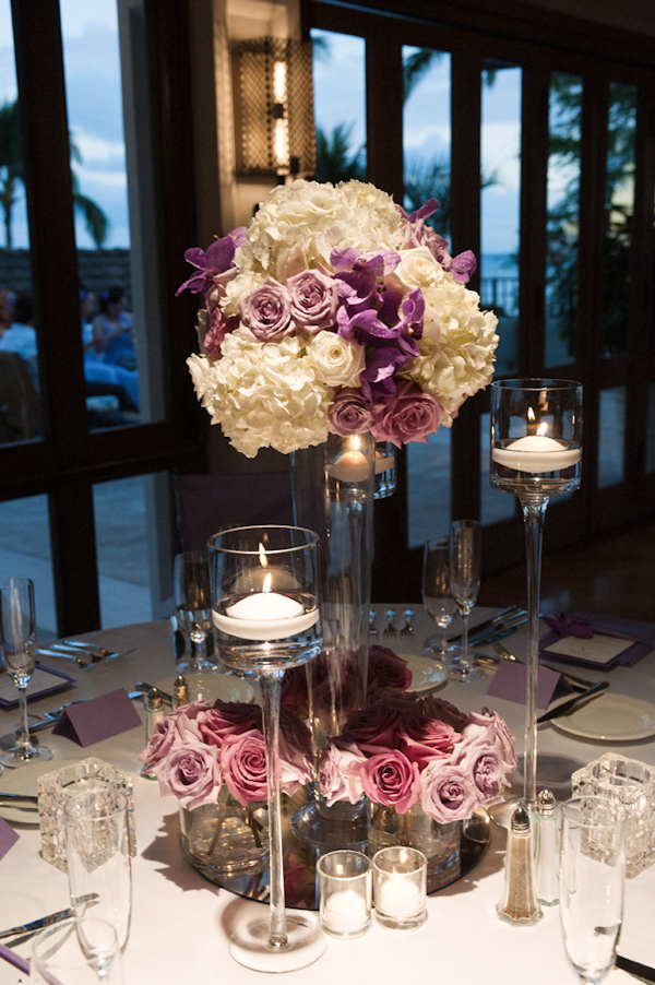 white, lavender and purple centerpiece with candles - Honolulu destination wedding photo by top Hawaiian wedding photographer Derek Wong