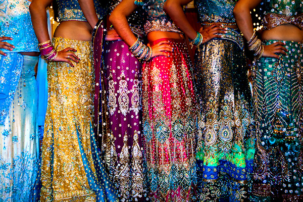 brightly colored Indian saris - bridesmaids - photo by Florida based destination wedding photographer Chip Litherland of Eleven Weddings