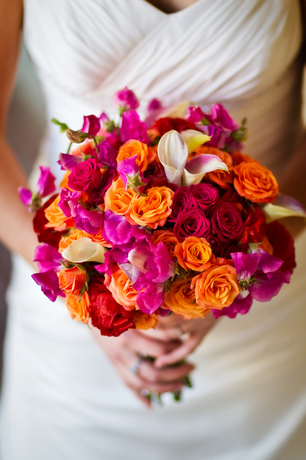 gorgeous red, pink, orange, and ivory bridal bouquet - photo by Washington DC based wedding photographers Holland Photo Arts