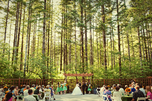 beautiful outdoor wedding ceremony in forest area - photo by Seattle based wedding photographer Jenny J