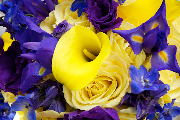 closeup detail of a yellow and purple bouquet - wedding photo by top Philadelphia based wedding photographers Langdon Photography