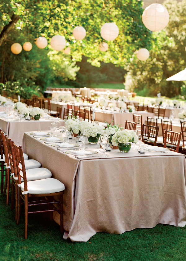 outdoor reception - khaki table clothes and white paper lanterns - photo by San Francisco based wedding photographer Lisa Lefkowitz