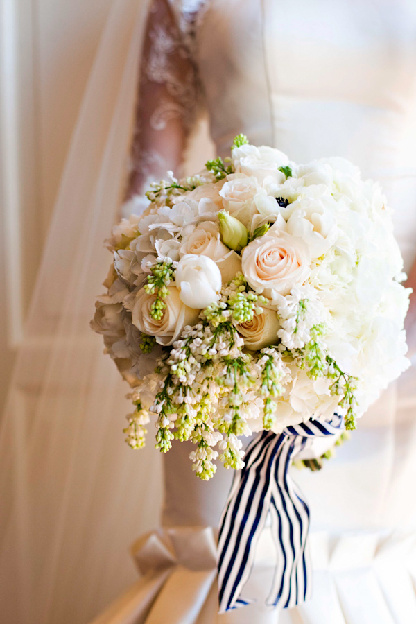 Bridal bouquet with white and blush roses and black and white striped ribbon for wedding at The Mountain Brook Club, Birmingham, Alabama | Photo by Ann Wade Parrish Photography and Arden Photography