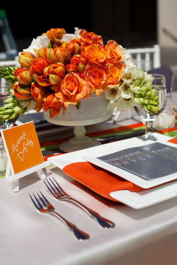 Orange citrus-inspired centerpieces for wedding reception table - Citrus Colored Wedding Decor Photo Shoot by Cadence Cornelius Photographs 