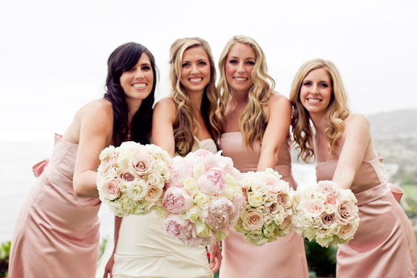 Bride and bridal party with bouquets - wedding photo by Focus Photography