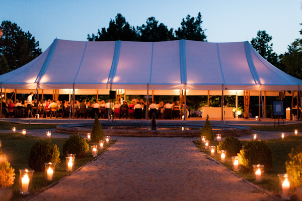 Outdoor reception tent with lighting details - wedding photo by Ian Holmes