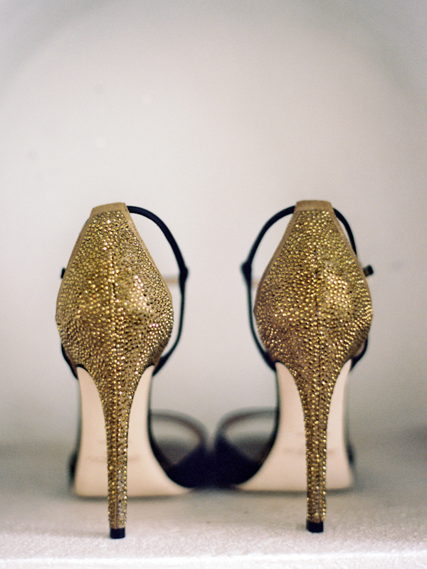Wedding photo with gold sparkly shoes by Jillian Mitchell