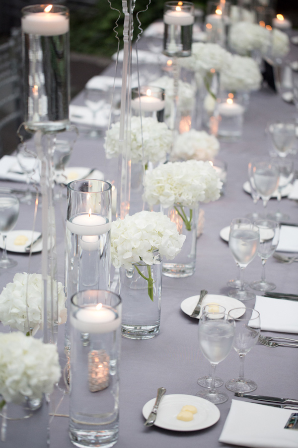 Wedding Photo by Miller and Miller Photography of silver and white table top decor