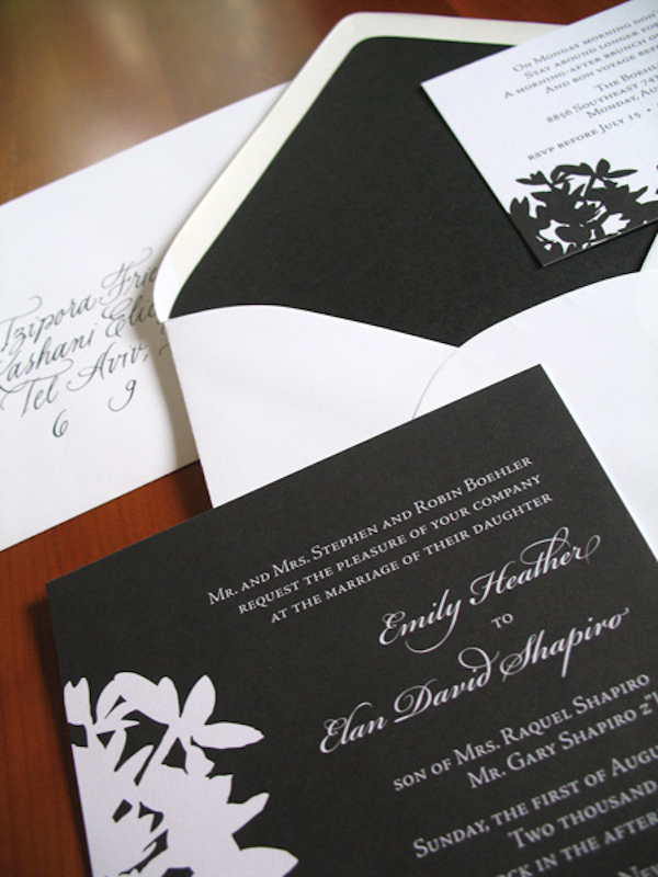 details of charcoal and white wedding invitation with inverted floral design - photo of wedding invitations designed by Brown Sugar Designs