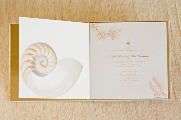 white wedding invitation with gold seashell and design - photo of wedding invitation designed by Flite Design