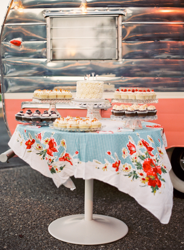 Beutiful dessert table on blue and red floral tablecloth - Photo by Michelle Warren Photography