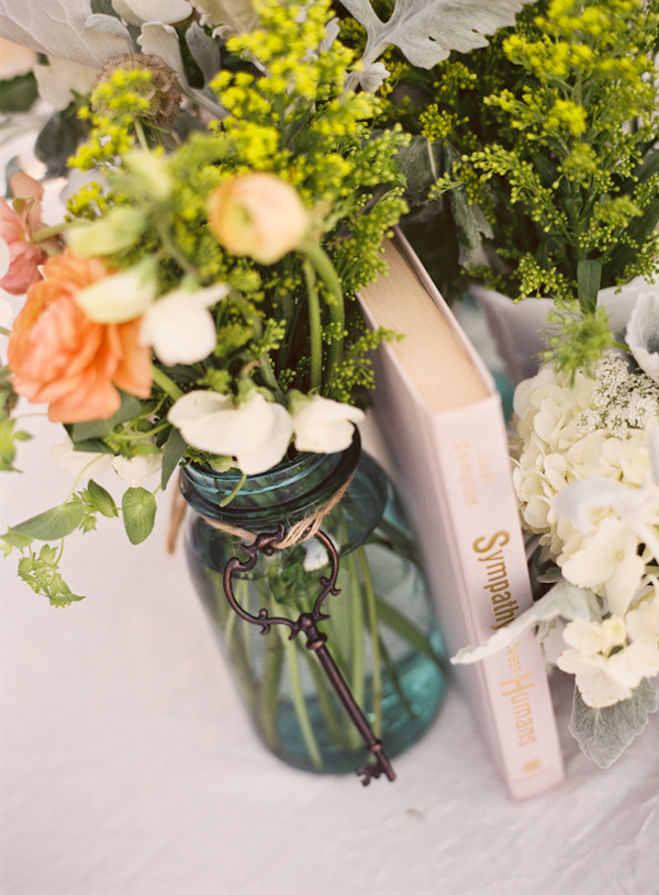 Vintage book and floral tabletop decor - Photo by Michelle Warren Photography
