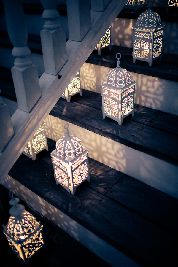 Decorative white lanterns for evening wedding reception - Photo by Sarah Tew Photography