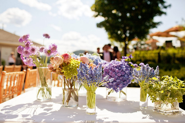 light blue, lavender and pink flowers on table - preppy New York Sagamore resort wedding photo by New York wedding photographer Tracey Buyce