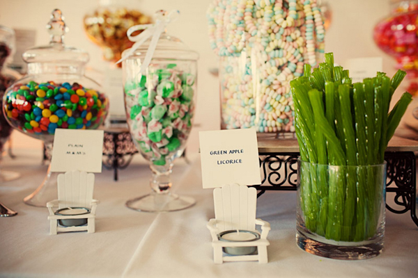 cute candy bar with hand written signs and candles - preppy New York Sagamore resort wedding photo by New York wedding photographer Tracey Buyce