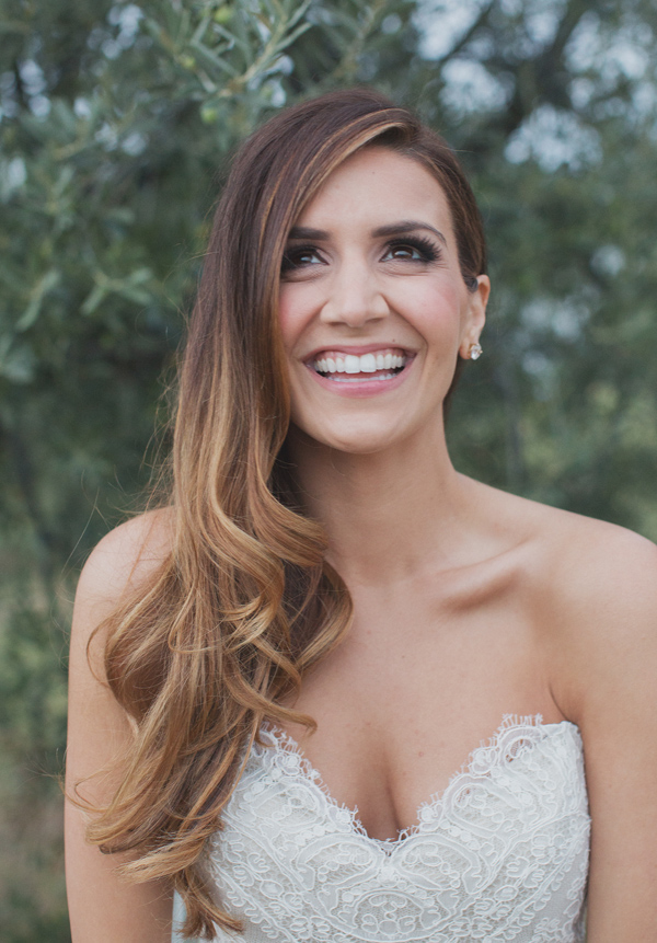 Beautiful, happy bride wearing her hair loose and down - Photo by Whitewall Photography
