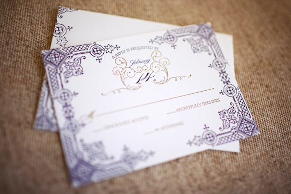beautiful white invitations with purple designs around the border - photo of wedding invitation designed by Wiley Valentine