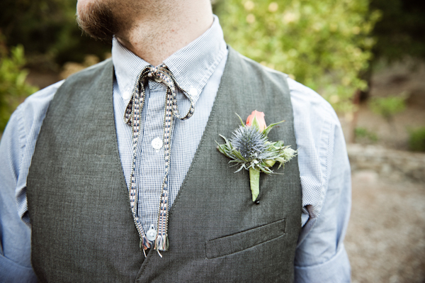 groom's gray vest and tie with pink and purple boutonniere - music inspired DIY wedding - photos by top Orange County, CA wedding photographers Viera Photographics