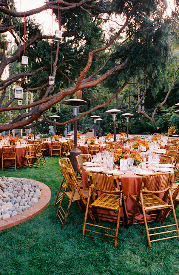 orange garden wedding tabletop photo by Yvette Roman Photography