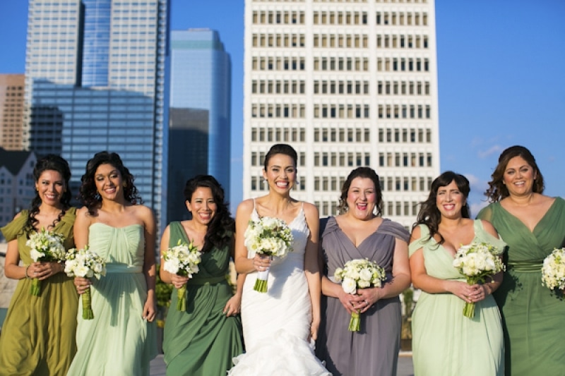 shades of green bridesmaid dresses at eco-friendly Jewish wedding at AT&T Center, Los Angeles, photo by Callaway Gable