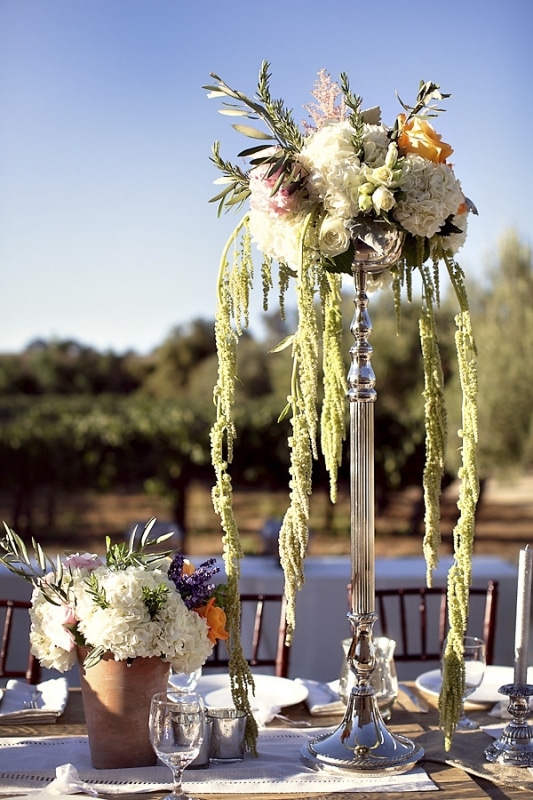 table centerpiece of organic floral arrangement, vineyard wedding at Sunstone Winery, photo by Ashleigh Taylor Photography