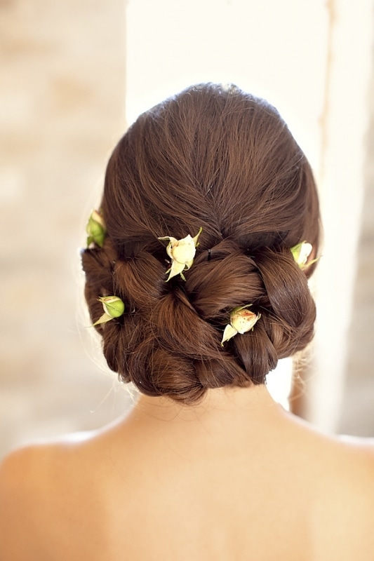 braided brides updo with white roses for vineyard wedding at Sunstone Winery, photo by Ashleigh Taylor Photography