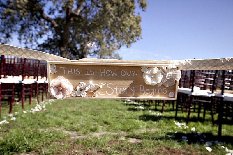 ceremony aisle signage at vineyard wedding at Sunstone Winery, photo by Ashleigh Taylor Photography