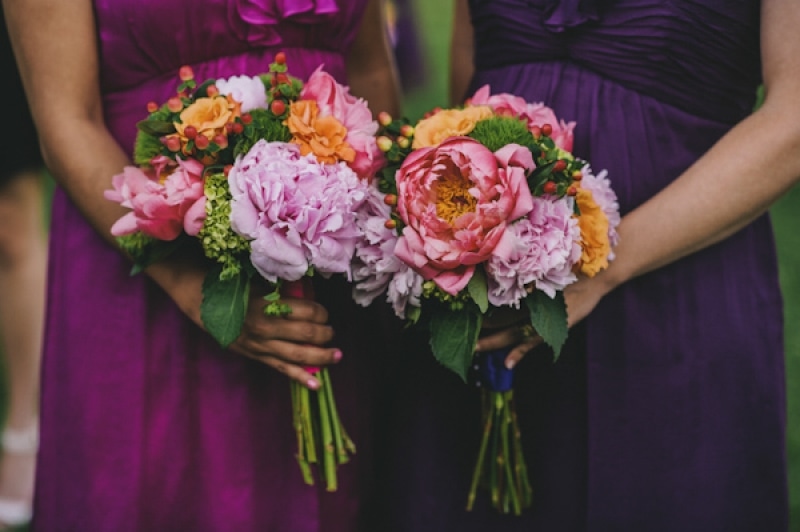 purple and pink bridesmaids bouquets, photo by The Oberports