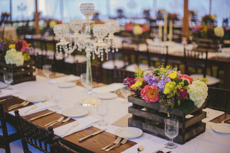 reception seating with candleabras and rustic floral centerpieces, photo by The Oberports