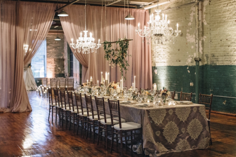 chandelier decor and table setting at wedding reception, photo by Vue Photography