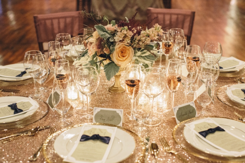 gold table top at wedding reception, photo by Vue Photography