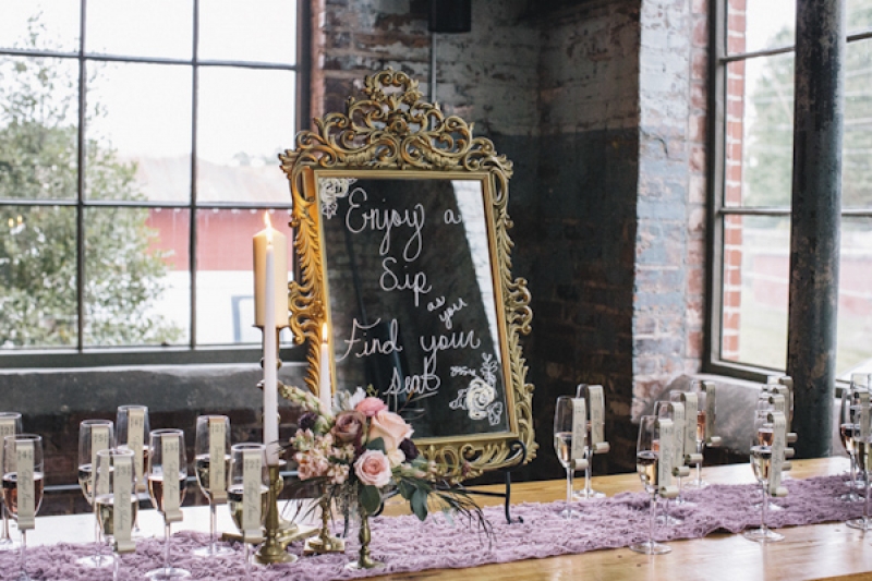 signage on mirror for escort cards, photo by Vue Photography
