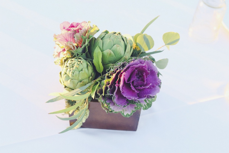 centerpiece with cabbage flower and artichokes, photo by Christina Carroll Photography