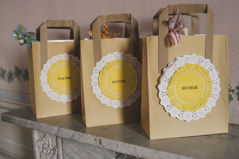 yellow and white lace doily gift bags, photo by This Modern Love