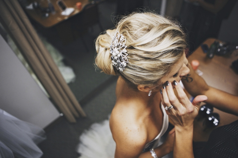 bridal hairstyle with silver hair accessory, photo by DWJohnson Studio