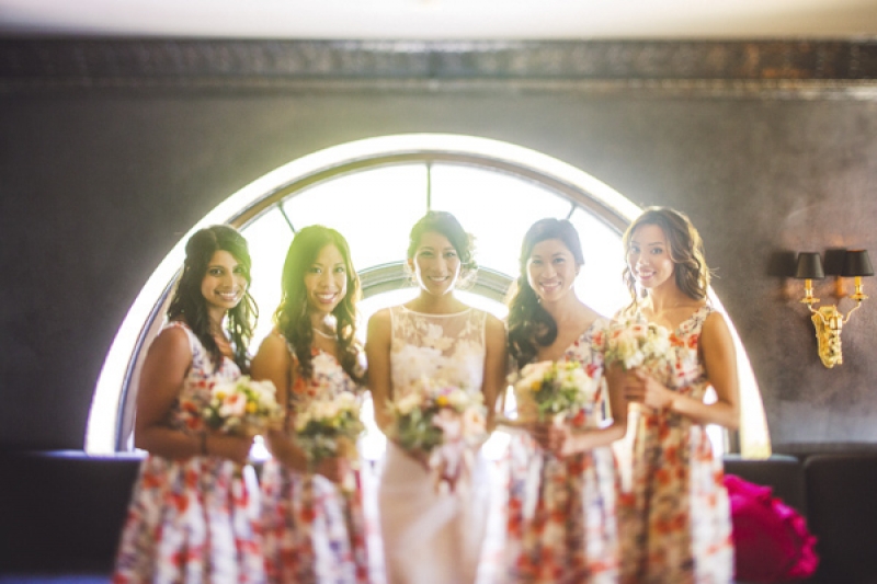flowered bridesmaid dresses and sheath lace wedding dress, photo by Jeff Newsom