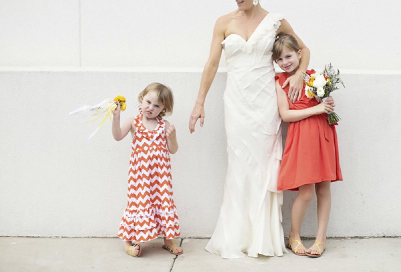 flowergirls in orange dresses, photo by Paperlily Photography