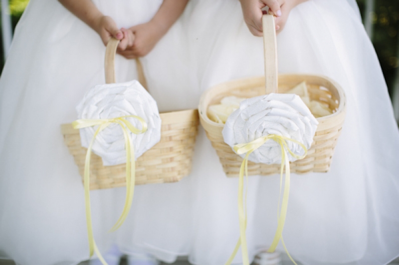 white floral baskets for flower girls, photo by Dan Stewart Photography