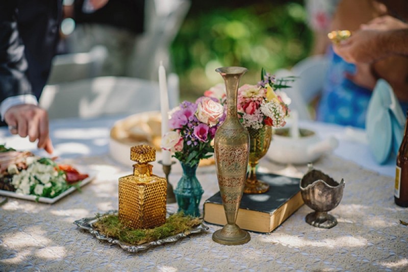 colorful eclectic backyard wedding Gabe McClintock vintage table decor