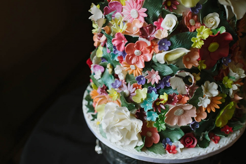unique intricate colorful wedding cake edible flowers