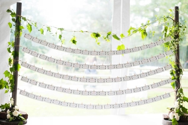 Elegant Garden Inspired Escort Card Display with Greenery and Vines