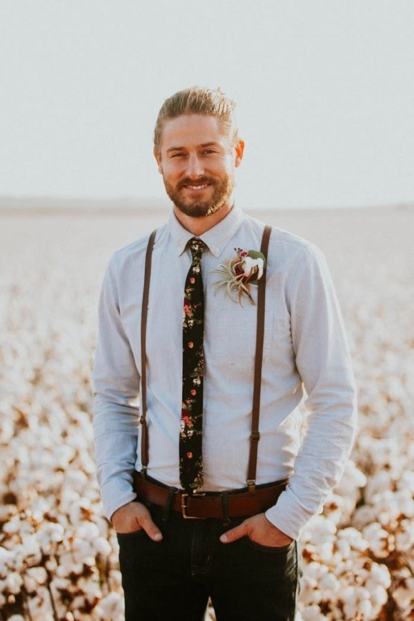 Alternative Rustic Groom Style with Floral Tie and Suspenders