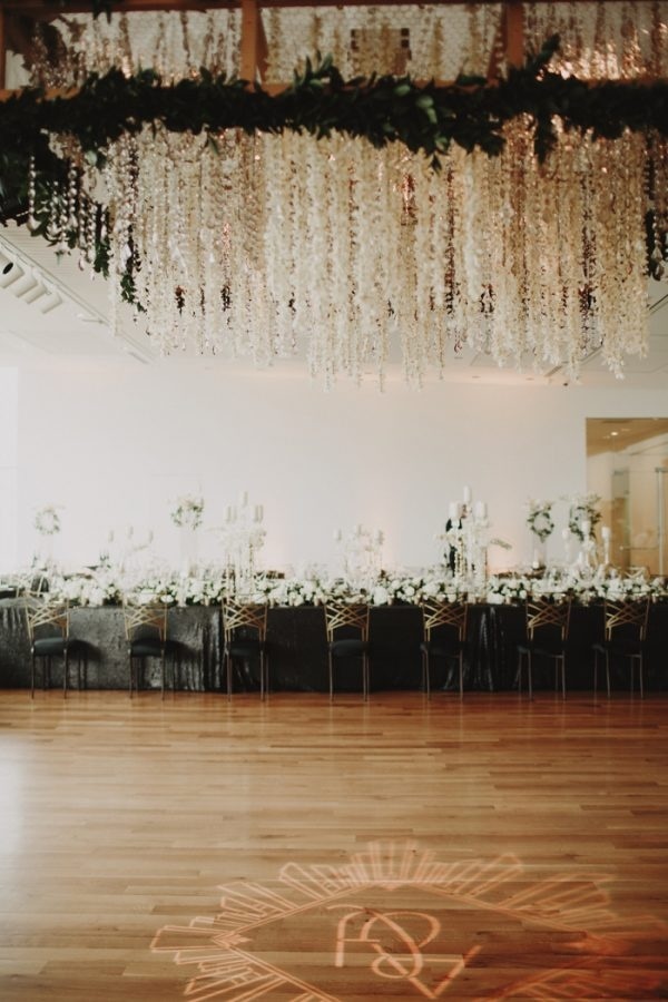 Modern Glam Ballroom Reception Cascading Floral Installation with Custom Initial Spotlight