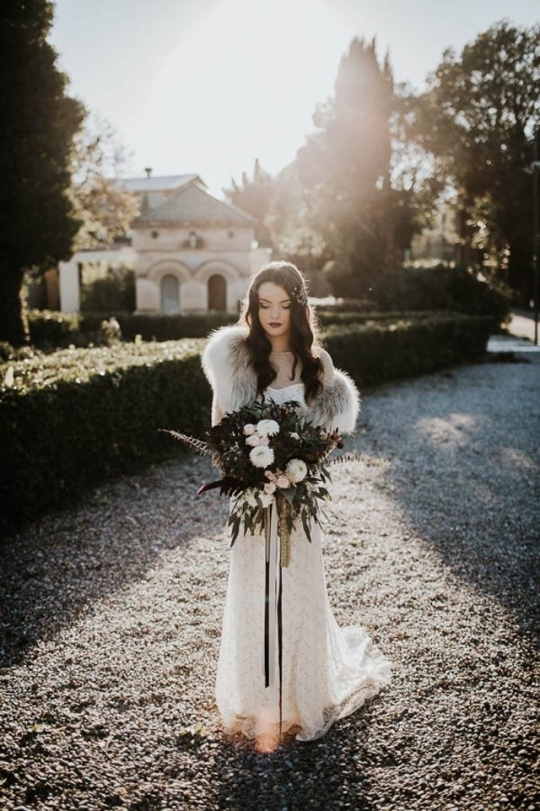 Winter Bridal Style with Fur Stole and Dark Makeup
