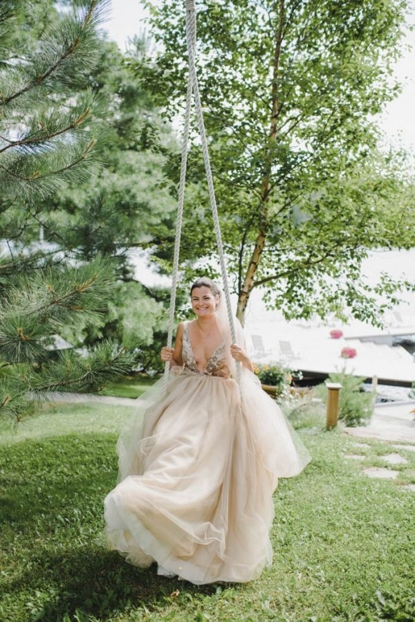 The Bride Swinging by the Lake Before the Ceremony