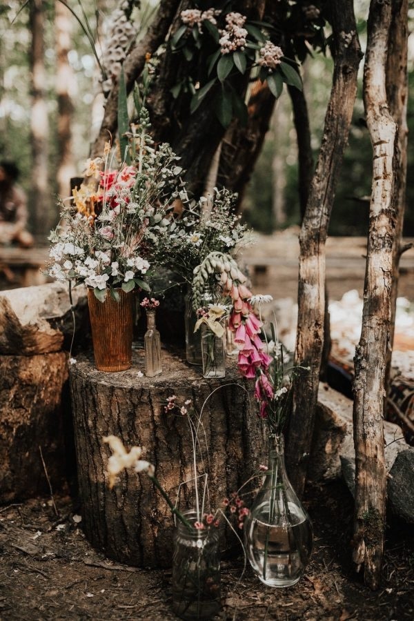 Rustic Floral Design with Wood Stumps and Wildflowers