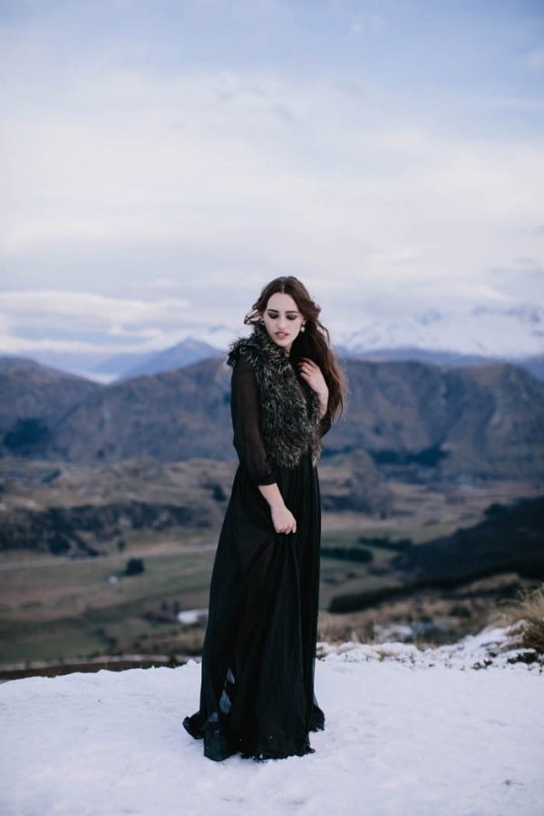 Winter Bridal Style with Black Dress and Fur Vest